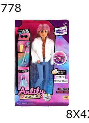 Stylische Anziehpuppe mit Wintermode und Zubehör