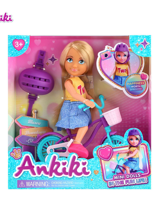 Fröhliche Mini-Puppe mit Fahrrad und Zubehör